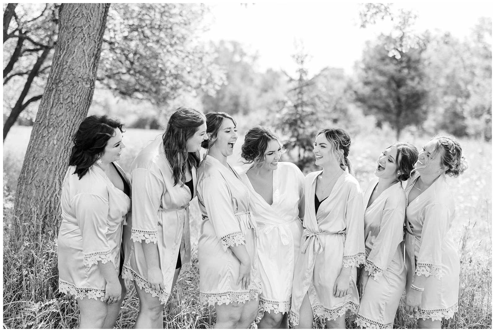 Bride and bridesmaids wearing getting ready robes
