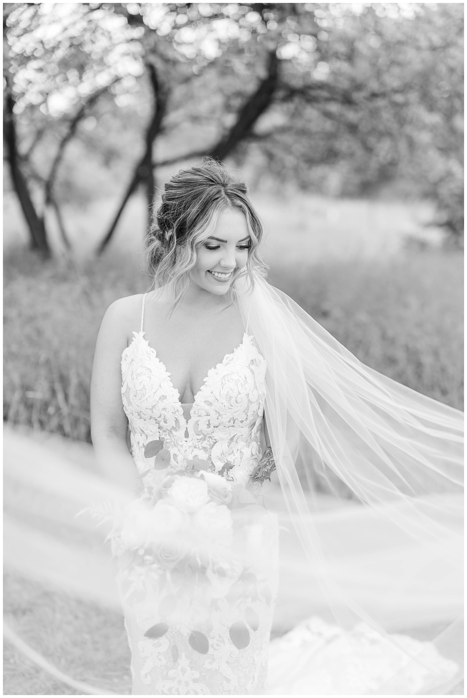 Outdoor bridal portraits with veil 