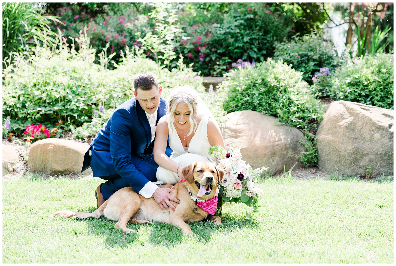 bride and groom photo with dog
