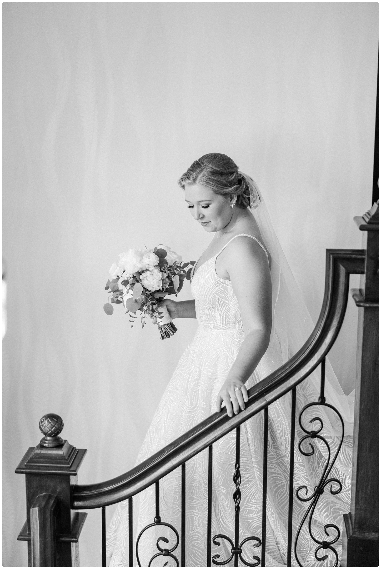 bride walking down staircase