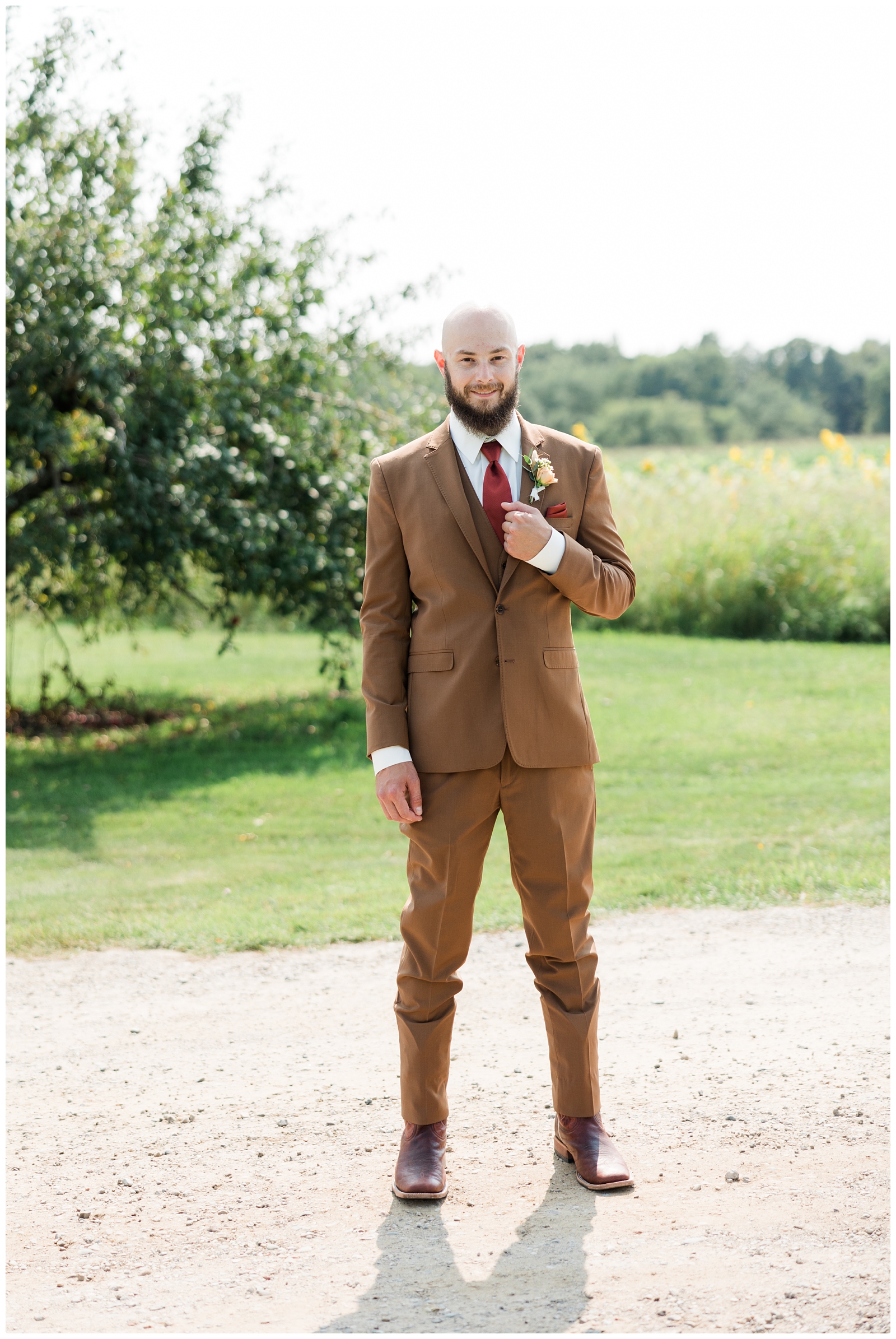 groom in brown suit