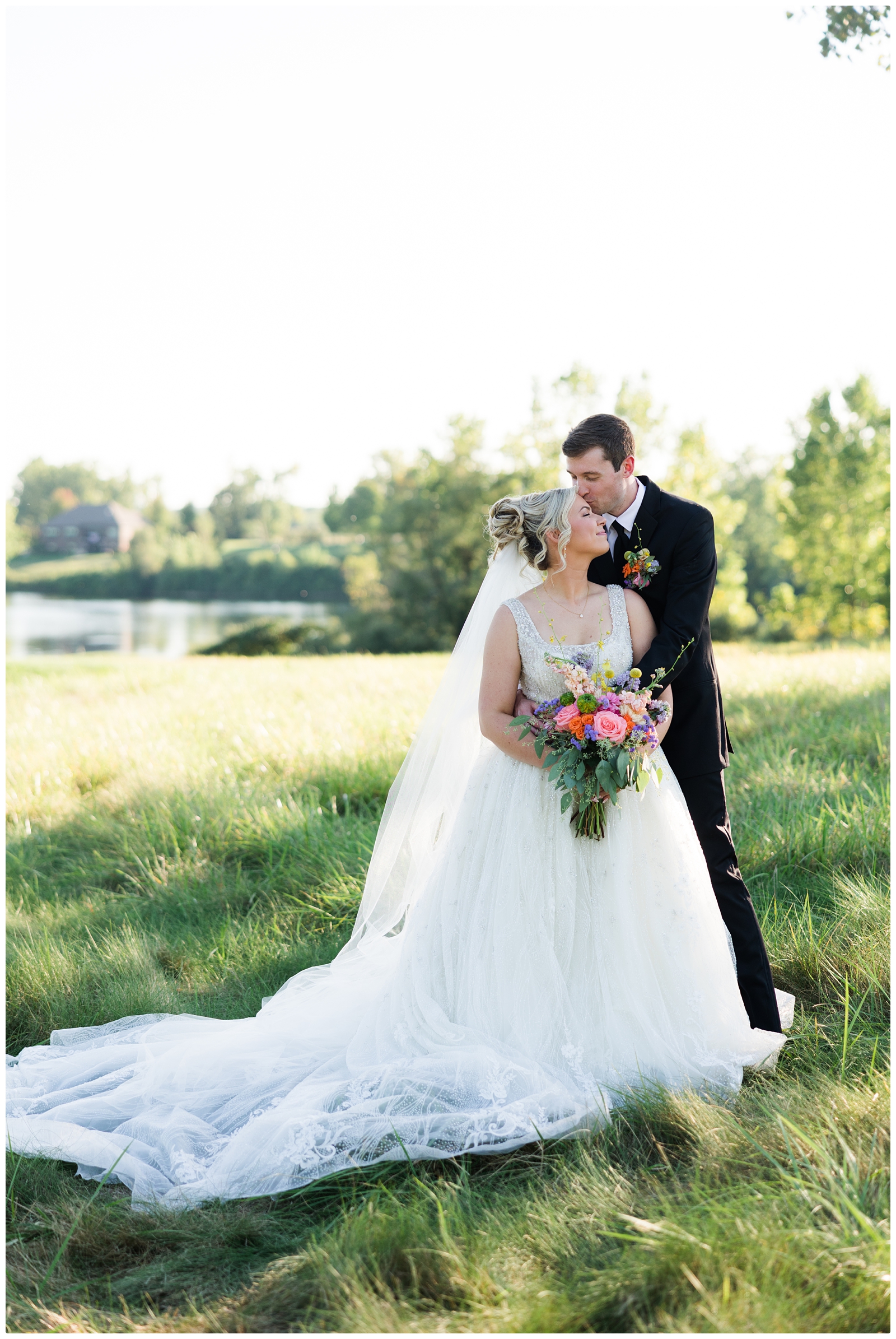 Greystone Golf Club & Banquet Center wedding photo of groom kissing bride