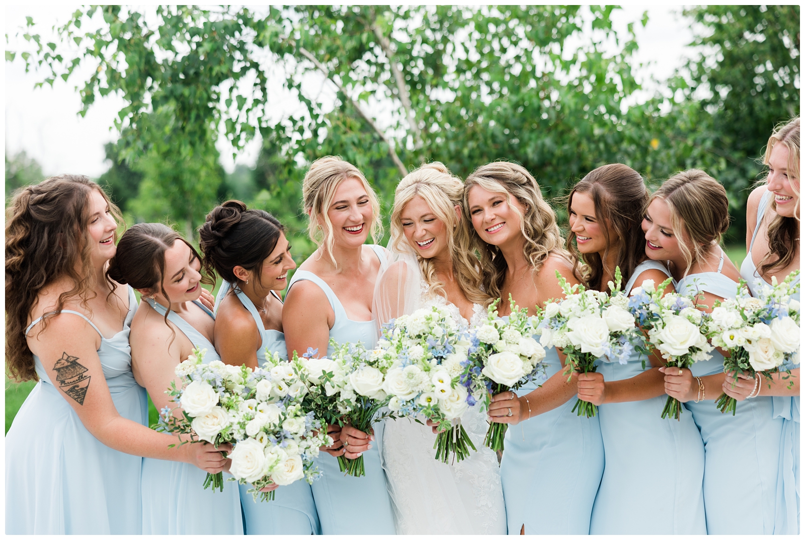 White Birch Wedding Barn photo with bride and bridesmaids