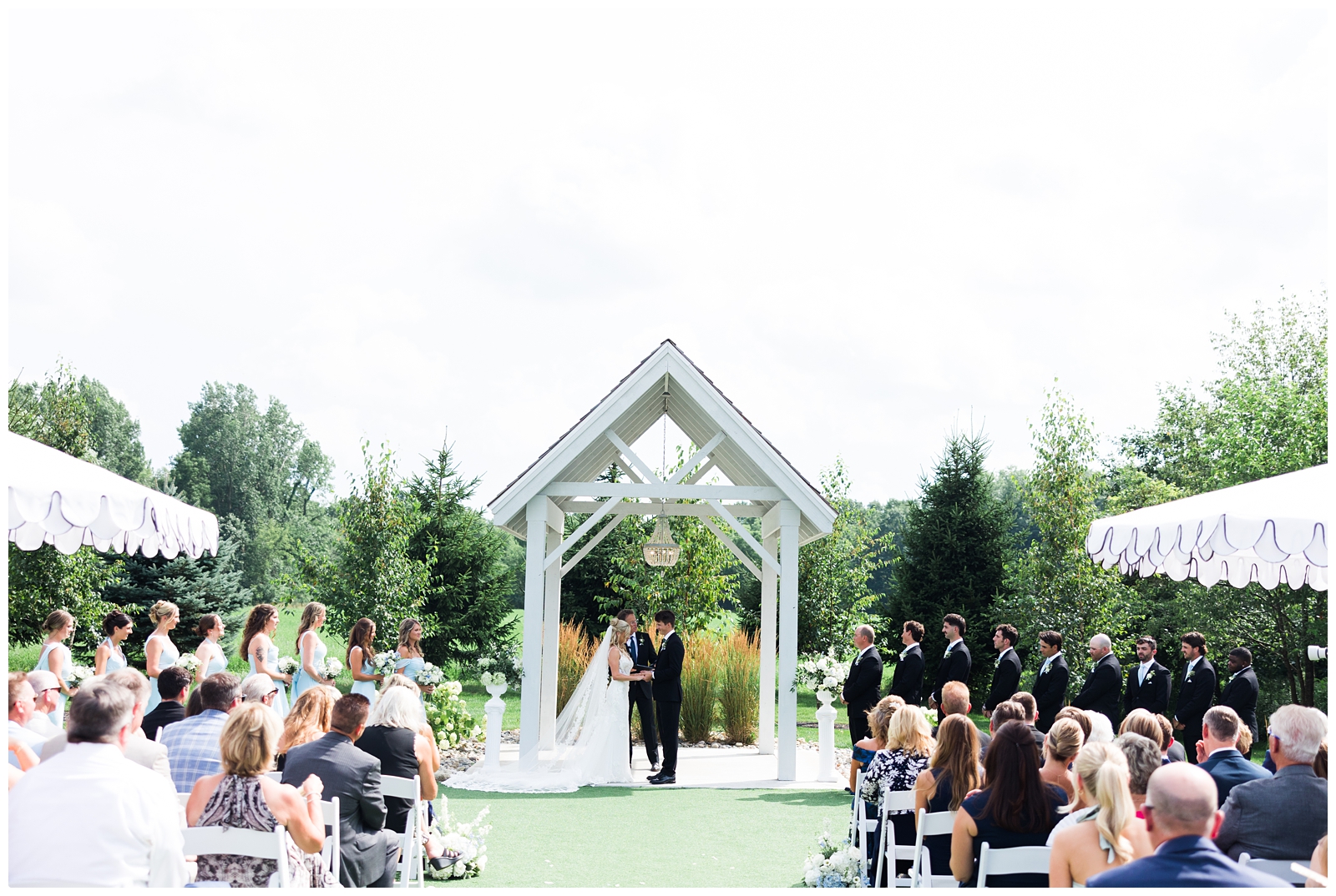 White Birch Wedding Barn wedding ceremony outside